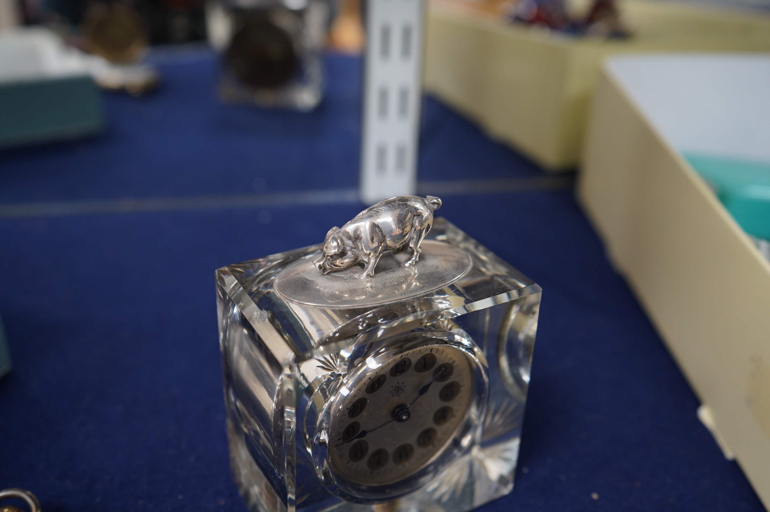 A gold plated Vertex hunter pocket watch and a George V silver mounted glass desk timepiece, with pig finial, height 95mm. Condition - poor.